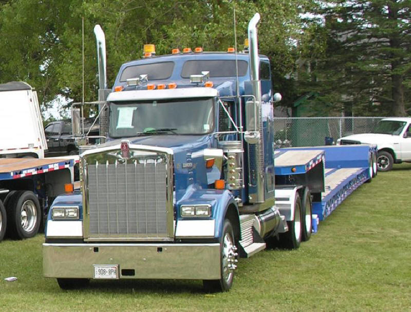 Blue Kenworth with lowboy trailer at Fergus Truck Show