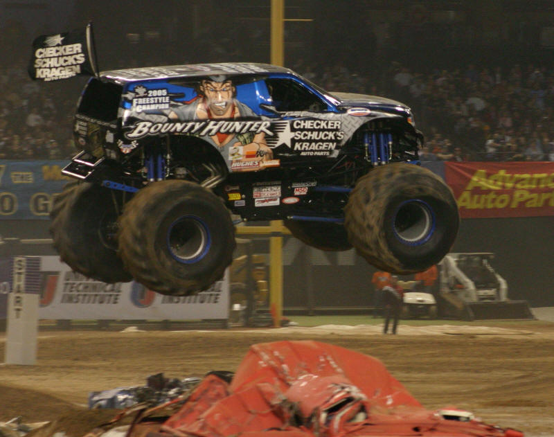 Bounty Hunter Monster Truck in the air in front of excited spectators
