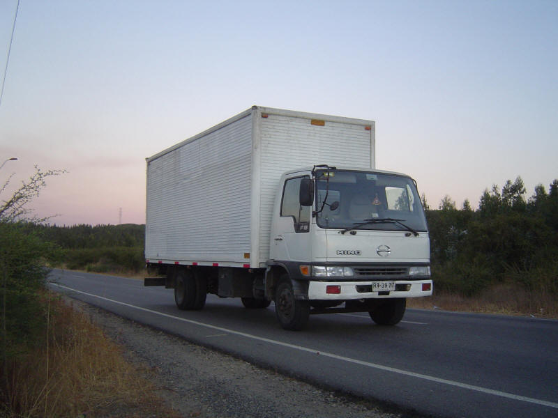 White Hino Six Wheeler Truck on the road