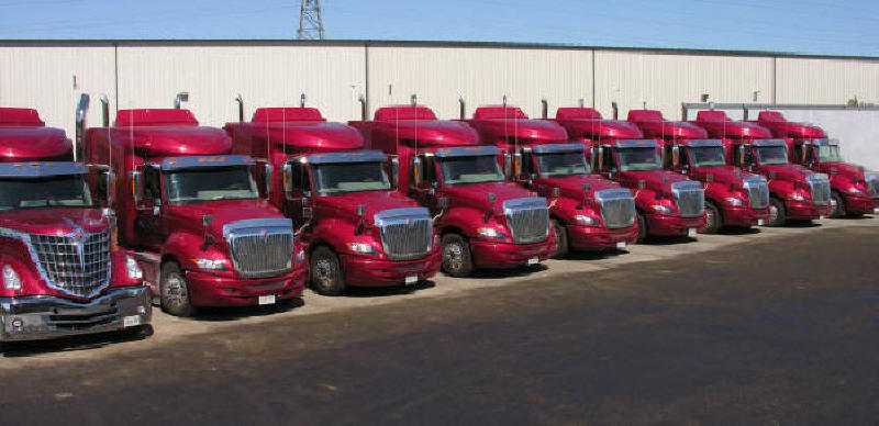 picture of fleet of International Prostar Tractor trailer truck cabs