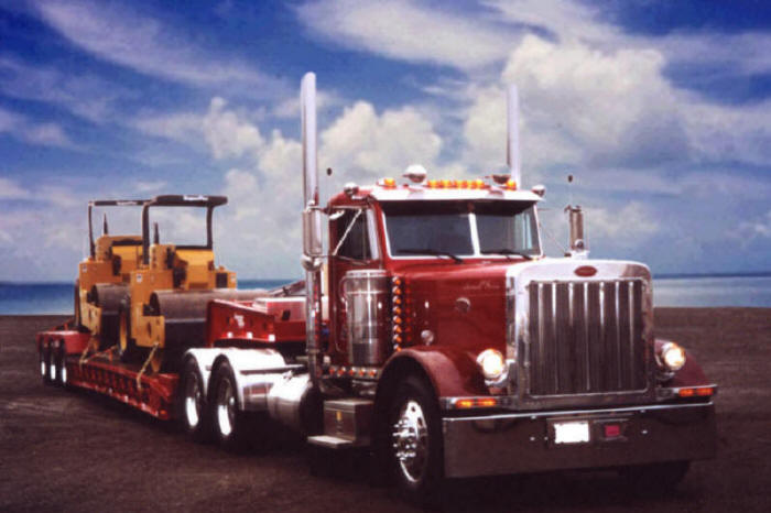 Peterbilt heavy equipment hauler with lowboy trailer