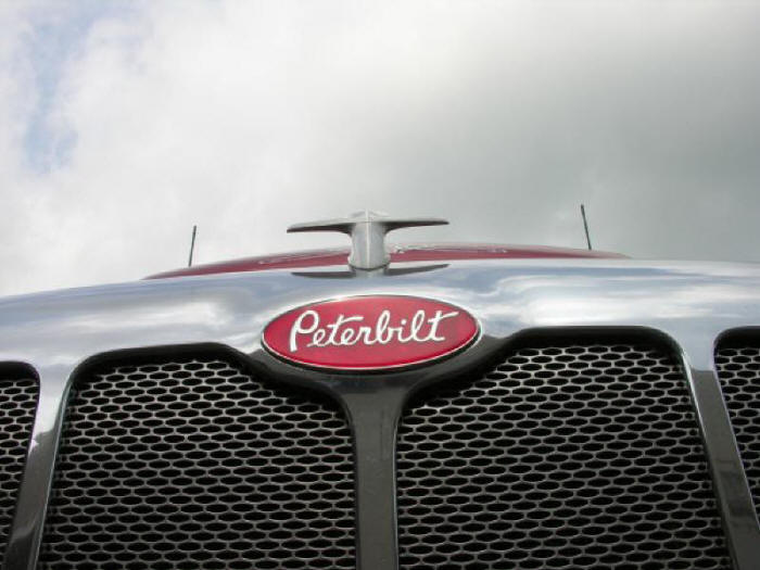 Peterbilt hood ornament and logo plate onbstainless steel grill